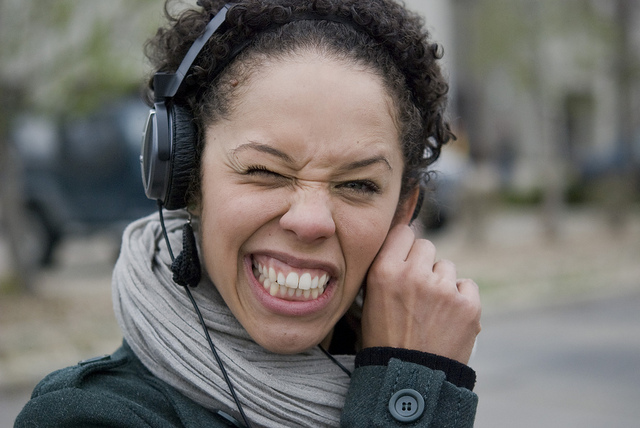 woman-headphones-confused.jpg