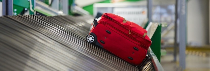 baggage-claim-one-bag-alone-featured-shutterstock-151385000-830x282.jpg