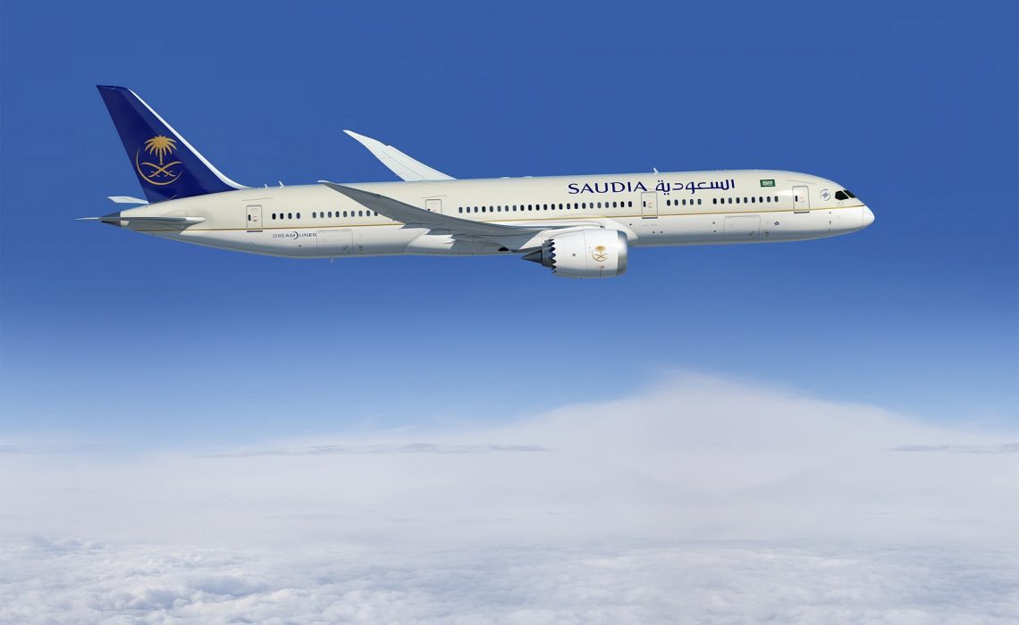 787-9; Saudia; 1st Delivery; air to air; left side of plane; above clouds; K66503